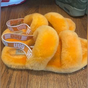 Uggs, orange, good condition, size 4, big kid sized.